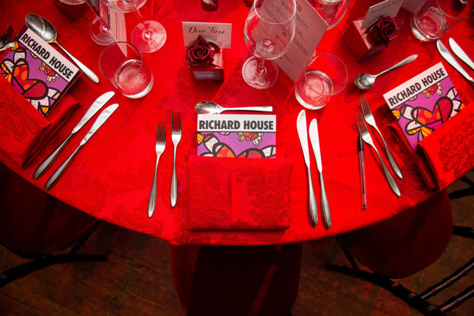 Romero Britto attends the Richard’s House Gala and donates a one of a kind painting on a Dolce & Gabanna handbag that auctioned for 72,000 pounds!